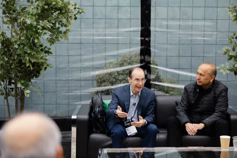 A CVAI4 discussion group in conversation on couches