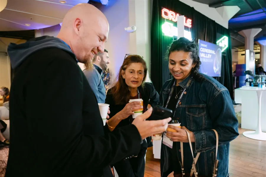 Attendees comparing notes over coffee at CVAI6